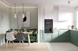 Apartment design with green kitchen