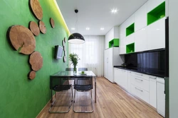 Apartment design with green kitchen