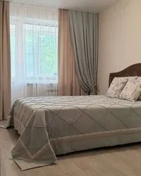 Bedspread and curtains for the bedroom photo