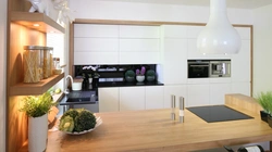 Interior of a wooden kitchen in white
