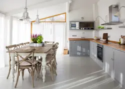 Interior of a wooden kitchen in white