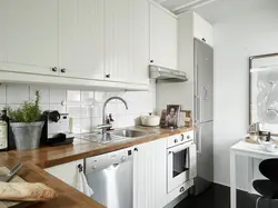 Interior of a wooden kitchen in white