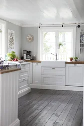 Interior of a wooden kitchen in white