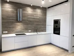 Black kitchen design without upper cabinets