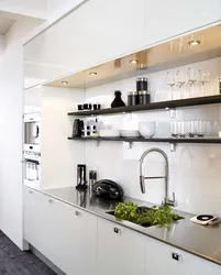 Black kitchen design without upper cabinets