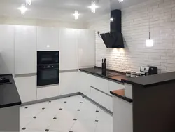 Black kitchen design without upper cabinets