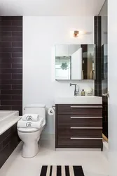 Dark furniture in the bathroom photo