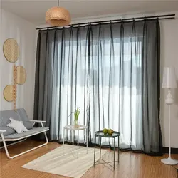 Living room with one curtain photo