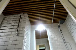 Bathroom ceiling with slats photo