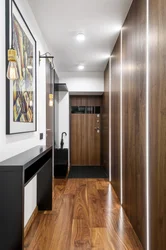 Interior design of the hallway in an apartment with a narrow corridor photo