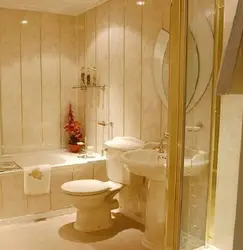 Bathroom trimmed with plastic panels photo design