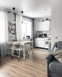 Birləşmiş qonaq otağı və mətbəxin fotoşəkili
