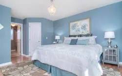 In The Bedroom In Blue Photo