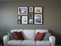 How to decorate a living room wall with photographs