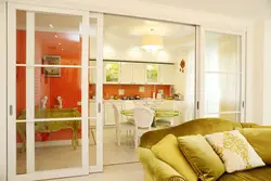 Openings between the kitchen and living room photo