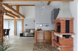 Photo of a kitchen with a stove in a wooden house photo