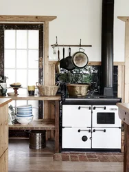 Photo Of A Kitchen With A Stove In A Wooden House Photo