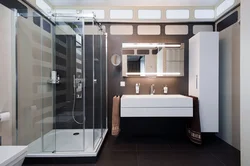 Bathroom design with shower on the wall