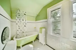 Bathroom design with wall painting and tiles photo design