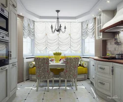 Kitchen in the bay window at home design photo