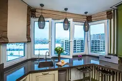 Kitchen in the bay window at home design photo