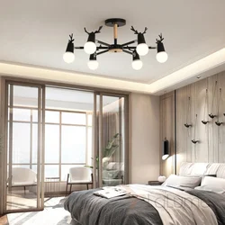 Stylish chandeliers in the bedroom photo