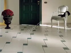 Tiles on the floor in the kitchen and hallway photo in the apartment