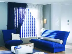 Blue curtains in the living room in a modern style photo in the interior