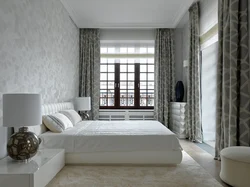 Small bedroom design with two windows