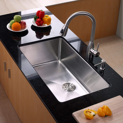 Sink built into the countertop for the kitchen photo