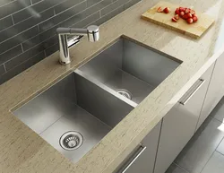 Sink built into the countertop for the kitchen photo