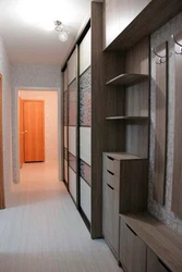 Sliding wardrobes in the hallway corridor in the interior