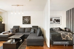 Bedroom and sofa in one room photo