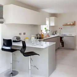 Kitchen interior with a bar counter in a small kitchen design photo