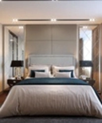 Mirrored bedroom in the interior photo