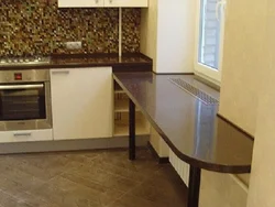 Window sill in a small kitchen photo