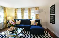 Curtains In The Interior Of The Living Room With A Blue Sofa Photo