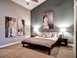 Photo on the wall in a modern bedroom interior