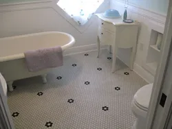 Tiles for bathroom floor in apartment photo