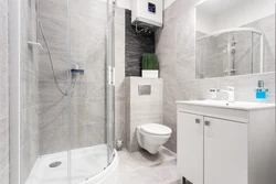 Modern bathroom design with shower and toilet and washing machine