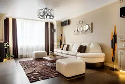 Light living room interior with dark furniture photo