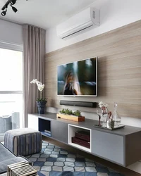 Decorate a wall in the living room with a TV in a modern style photo