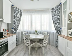 Curtains in the interior of the kitchen in Scandinavian style photo