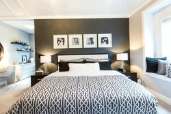 Paintings on the wall in the bedroom above the bed photo