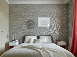 Bedroom design with combined wallpaper in a modern style