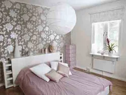 Bedroom design with combined wallpaper in a modern style