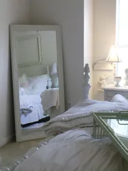 Mirror in the bedroom interior in a modern style