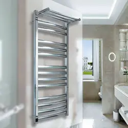 Heated towel rail in the bathroom photo