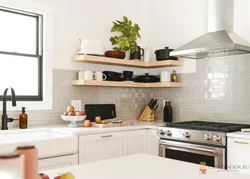Kitchens without upper cabinets with pencil case and refrigerator photo