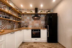 Kitchens without upper cabinets with pencil case and refrigerator photo
